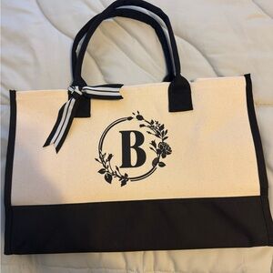 Chic Black and Cream Tote Bag with Monogram